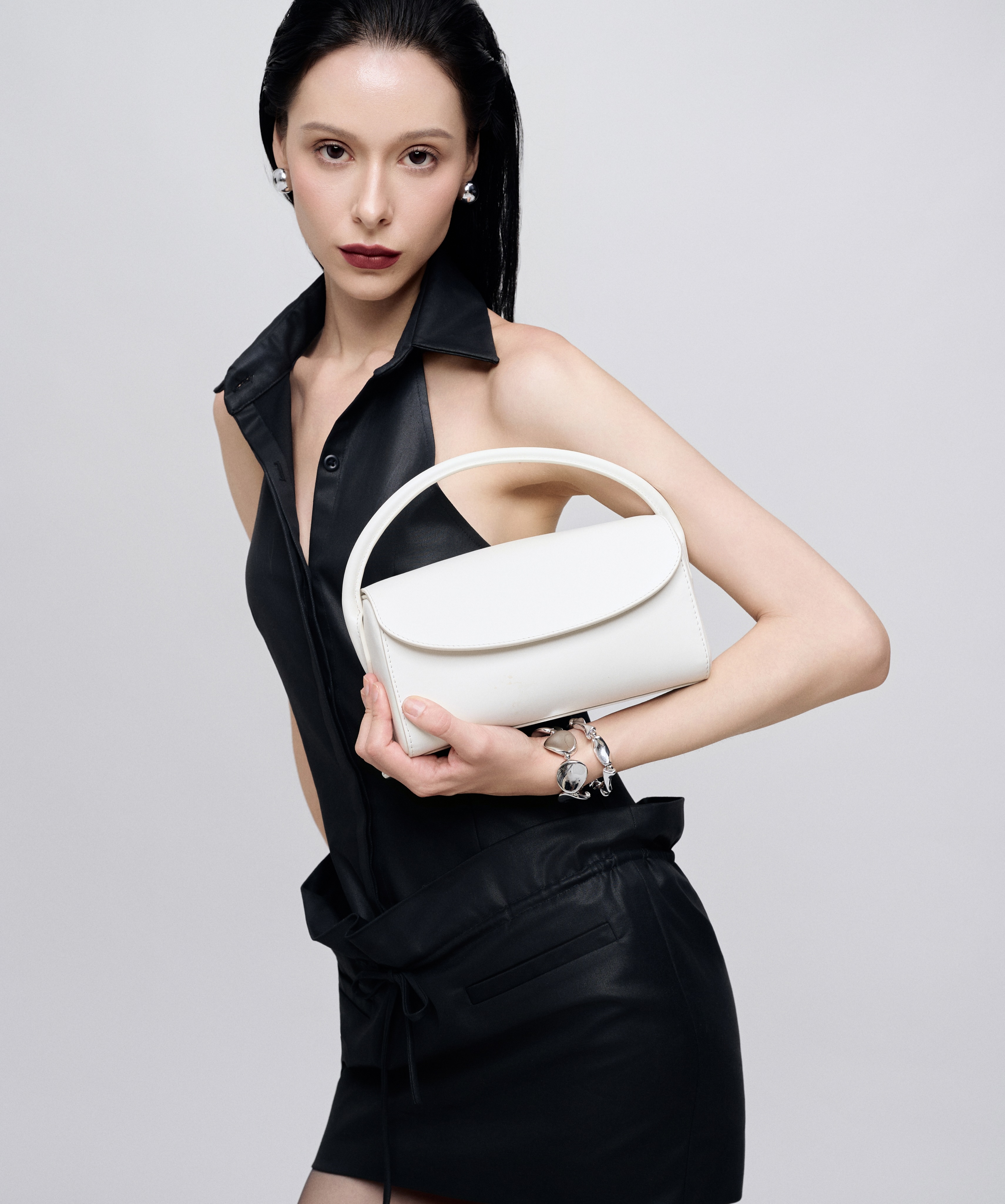 pham-official-black-leather-halter-set-white-bag-detail-03.jpeg